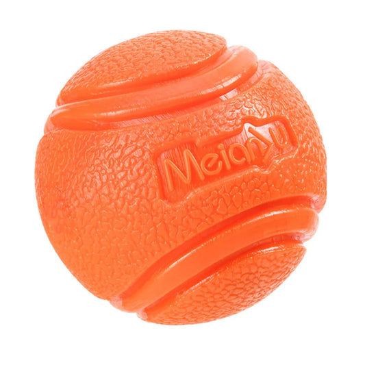 Balle orange chien